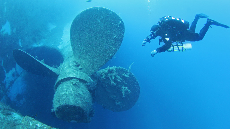 diver exploring a shipwreck