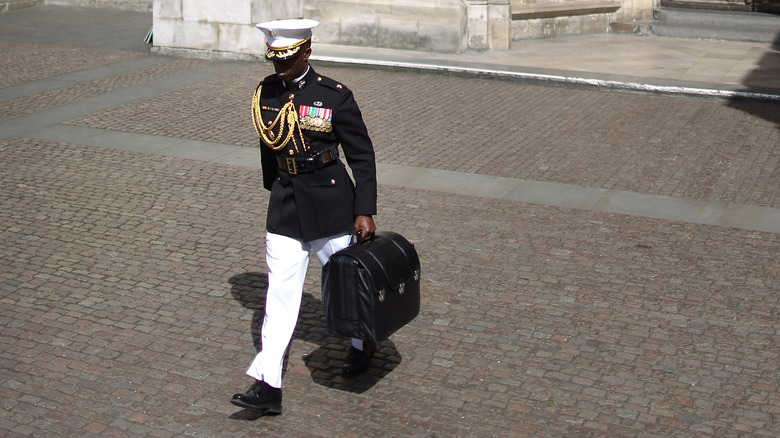 military officer carrying the nuclear football