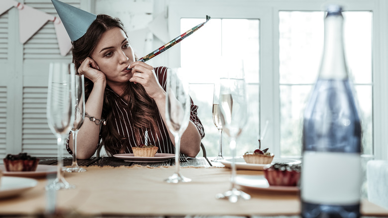 lonely stressed woman birthday party