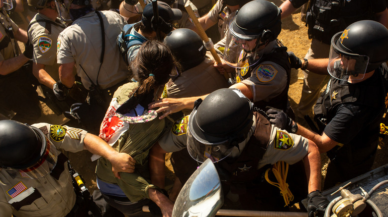 Police and water protectors during demonstration