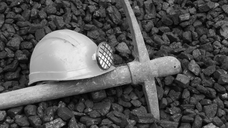 mining helmet and pick axe