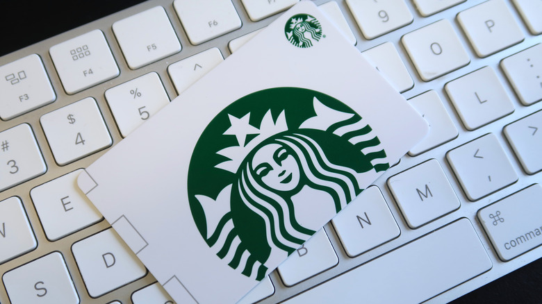Starbucks gift card on keyboard