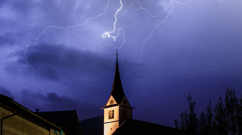 Church with lightening in background
