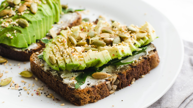 a plate of avocado toast