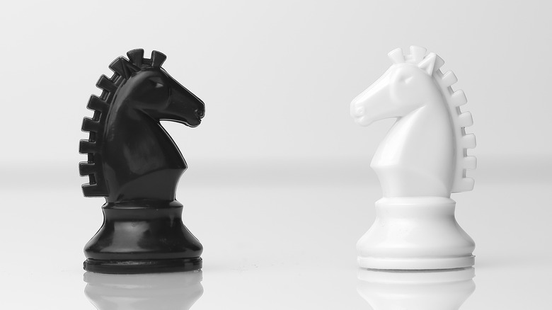 Black and white chess horses