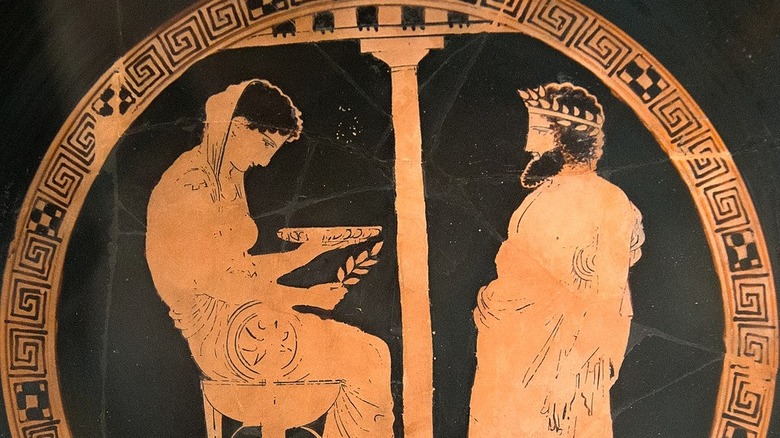 A king seeking council from the Oracle of Delphi