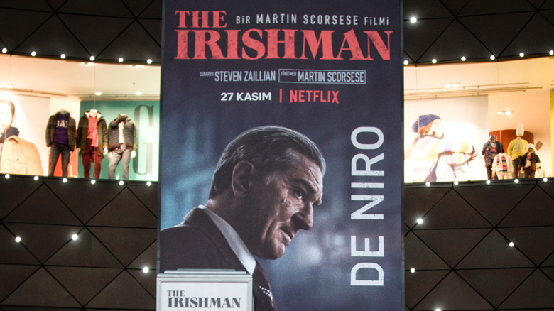 Poster for the movie The Irishman hanging in a mall