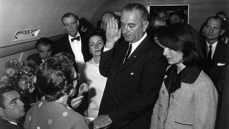Lyndon B. Johnson being sworn in on Air Force One