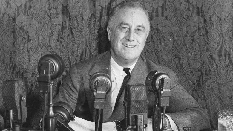 Franklin D. Roosevelt speaks to reporters