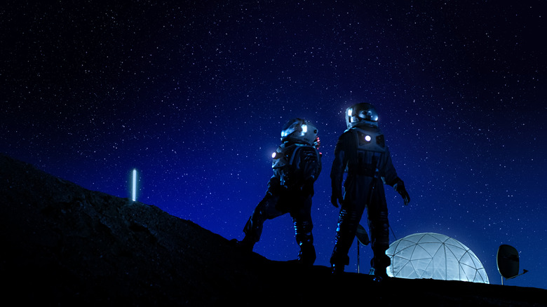 astronauts on alien surface