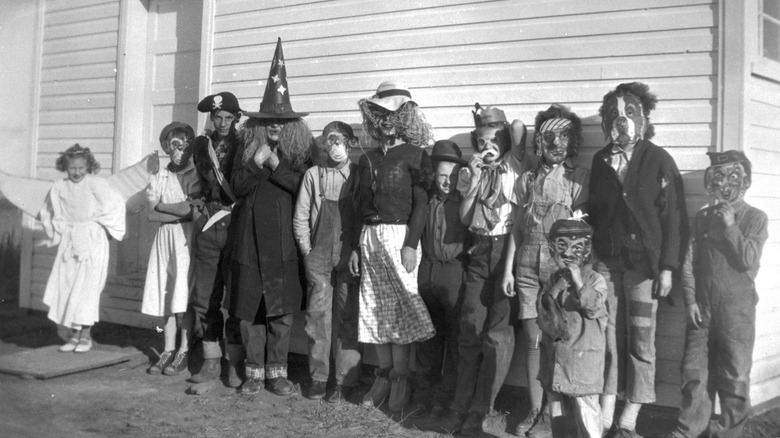 Children in Halloween costumes, Little Smoky River Farm Industries settlement, c. 1950
