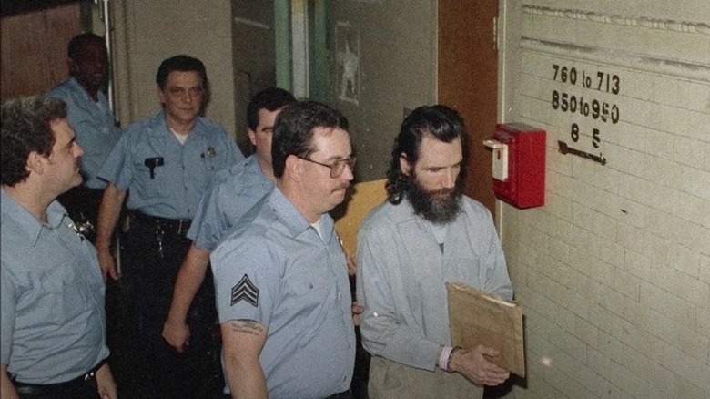 Gary Heidnik escorted by authorities