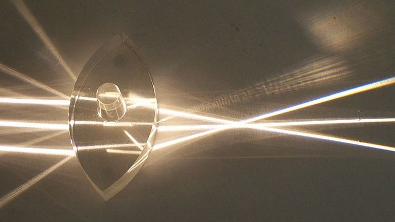 A glass lens bending light