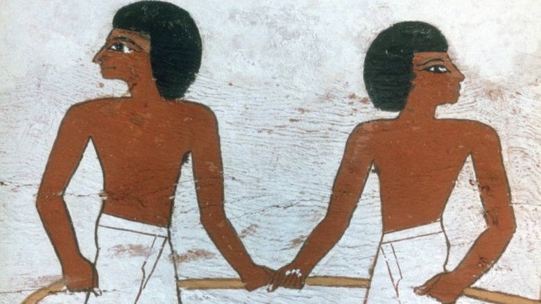 Two ancient Egyptian men at work