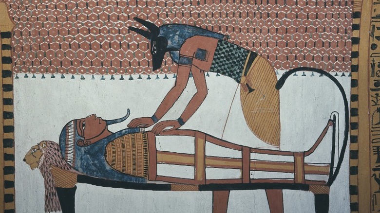 A fresco of a pharaoh and the god Anubis 