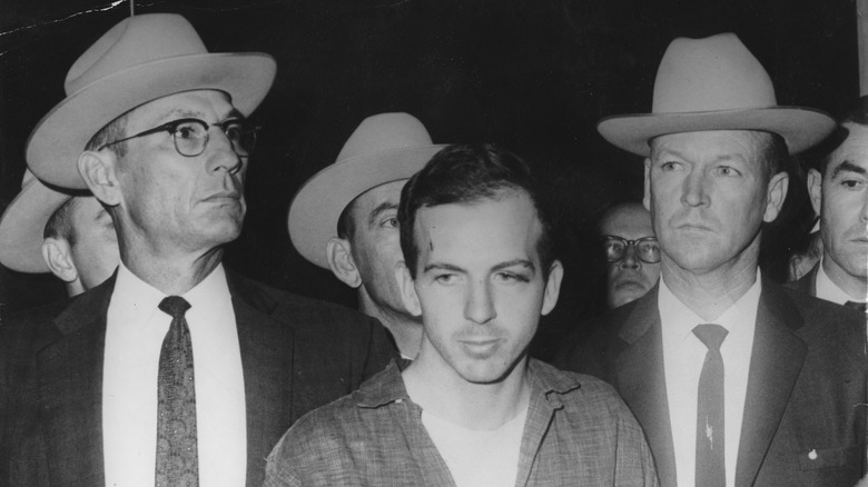 Lee Harvey Oswald being escorted