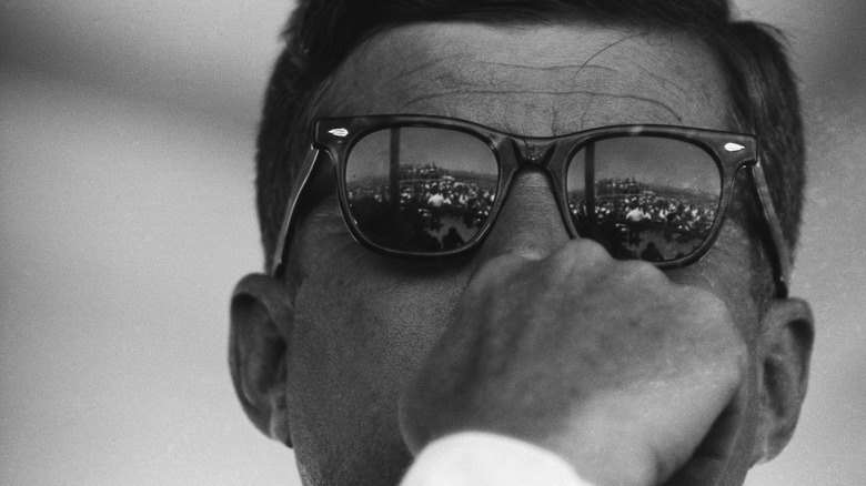 portrait of JFK with sunglasses on