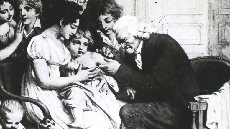 Edward Jenner inoculating child against smallpox