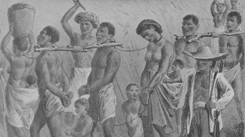 Shackled Africans being taken into slavery, circa 1700