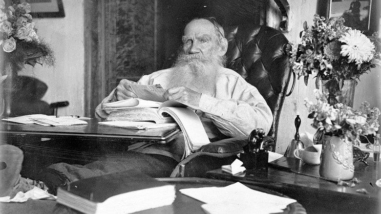 Leo Tolstoy working in his room