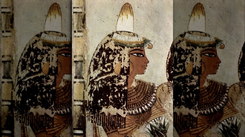 Ancient Egyptian woman wearing incense cone