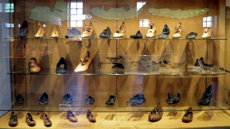 Roman shoes at Saalburg — black are original, brown reproductions