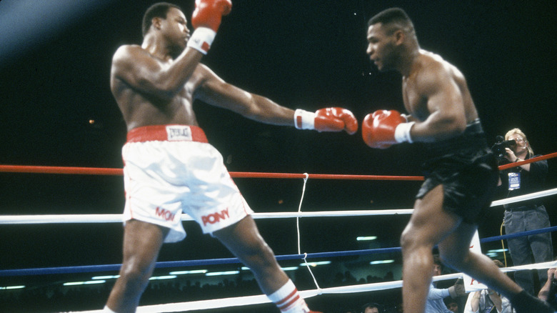 Larry Holmes fights Mike Tyson