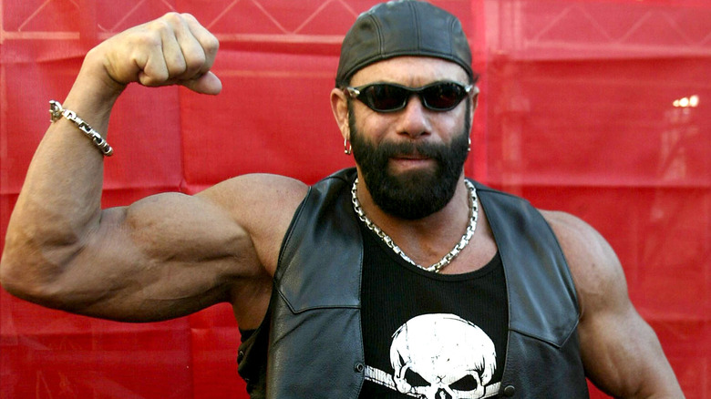Randy Savage flexing muscles