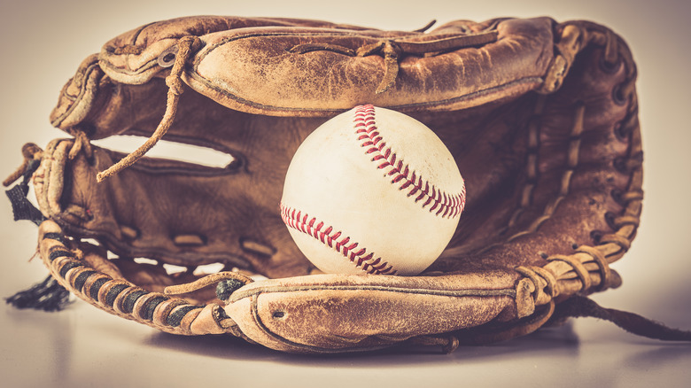 Baseball glove and ball