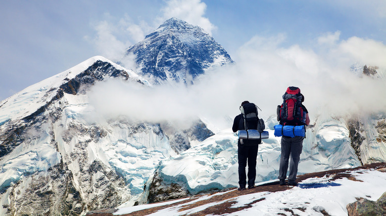 Everest climbers wearing backpacks
