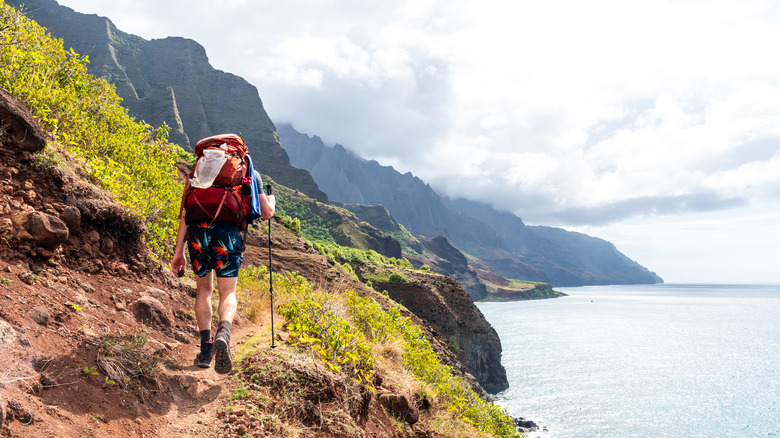 hiker Kalalau Trail Hawaii