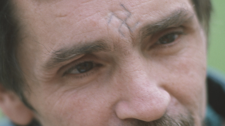 Manson with carved forehead swastika 