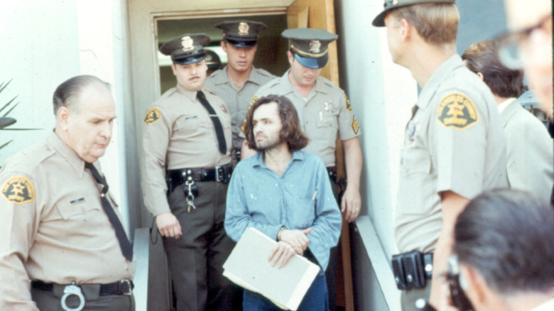 Manson escorted to court