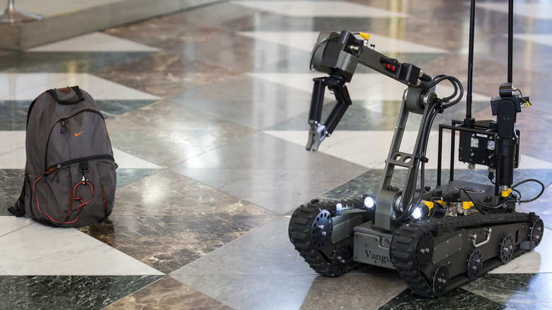 robot with a suspicious backpack during a sarin drill