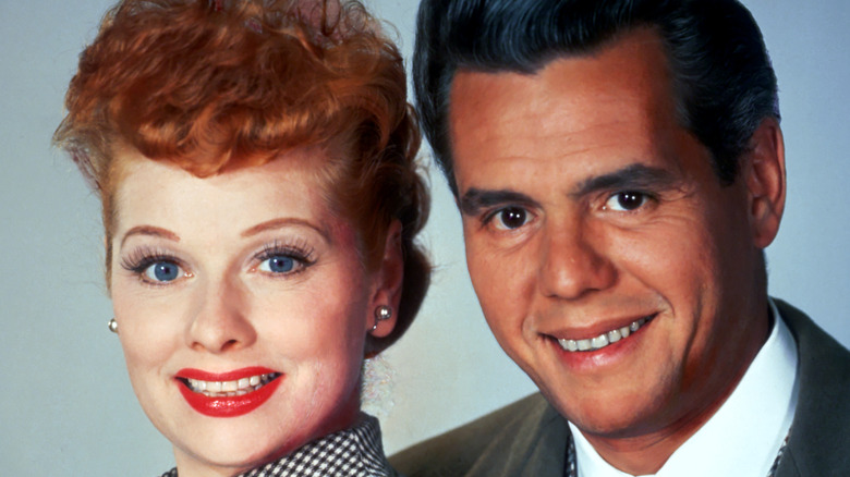Lucille Ball and Desi Arnaz smiling