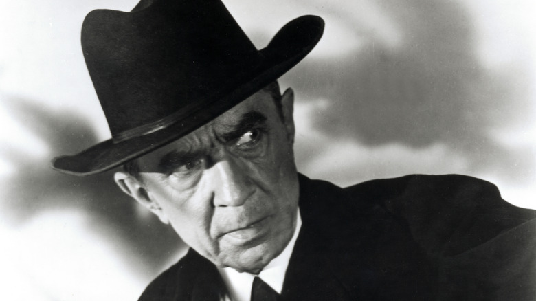 Bela Lugosi in a hat frowning
