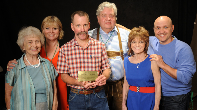 Peter Ostrum posing with castmates