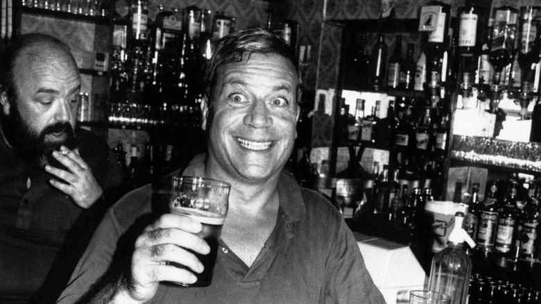 Oliver Reed at a pub
