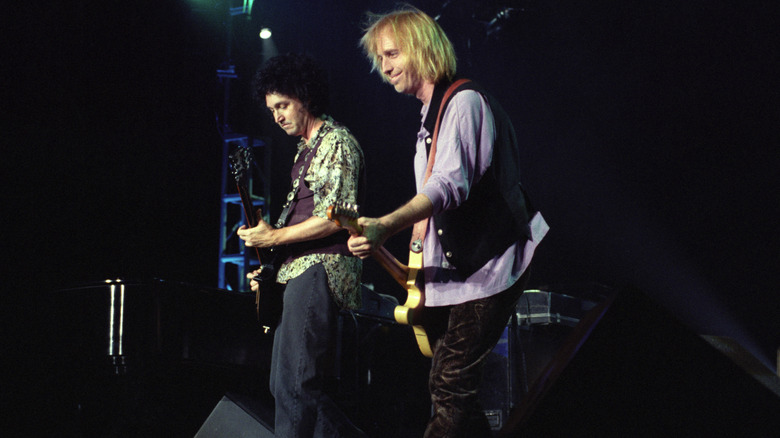 Mike Campbell and Tom Petty onstage