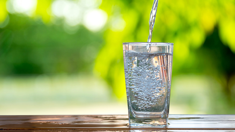 Water being poured into glass 