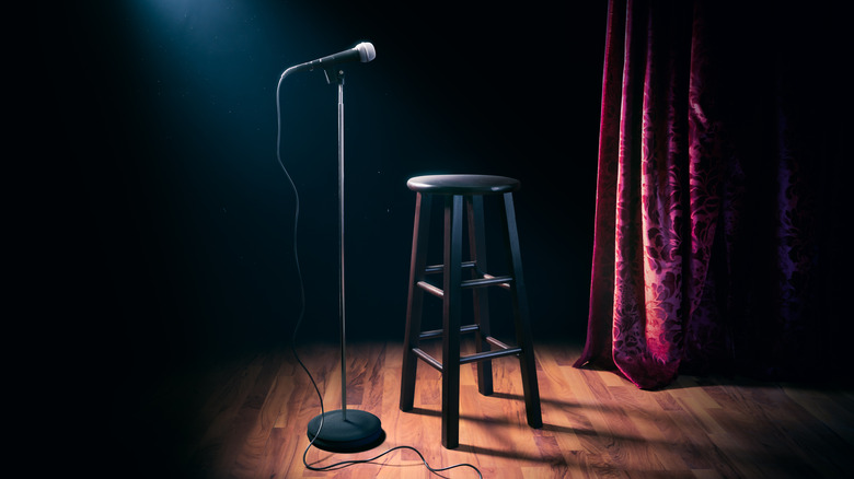 An empty stool and microphone