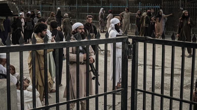 Taliban fighters guarding a border crossing