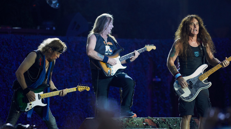 Iron Maiden performing on stage