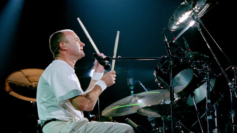 Phil Collins drumming and singing