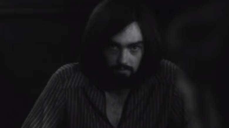 John David as Charles Manson