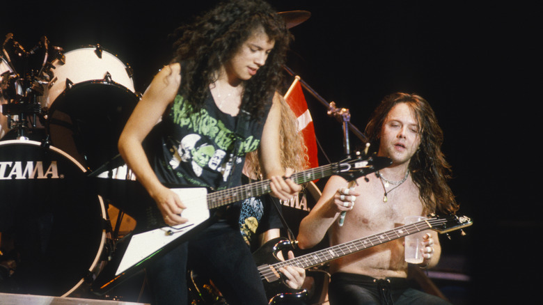 Kirk Hammett, Jason Newsted, Lars Ulrich performing