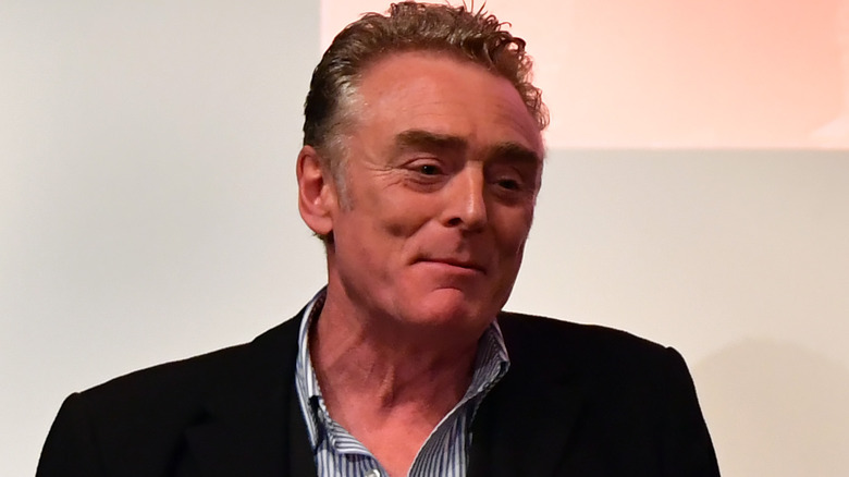 Brian Travers of UB40 smirking