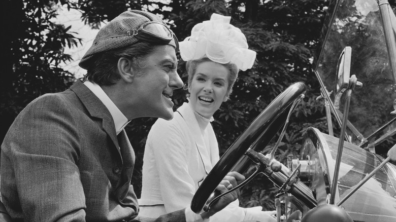 Dick Van Dyke and Sally Anne Howes seated in car 