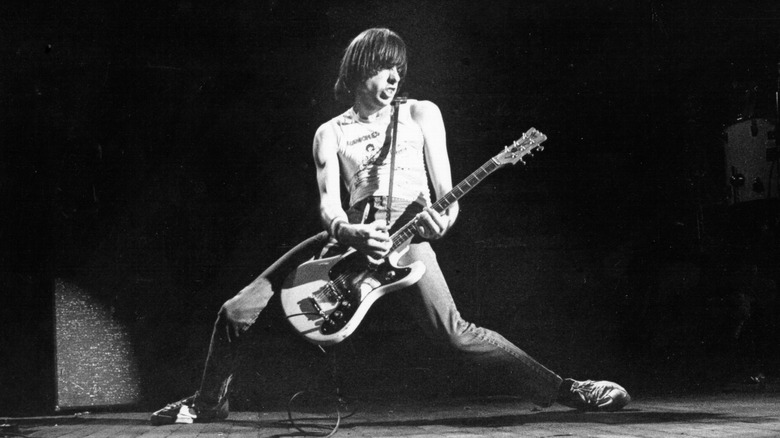Johnny Ramone playing guitar