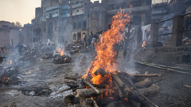 Funeral pyre burning in street